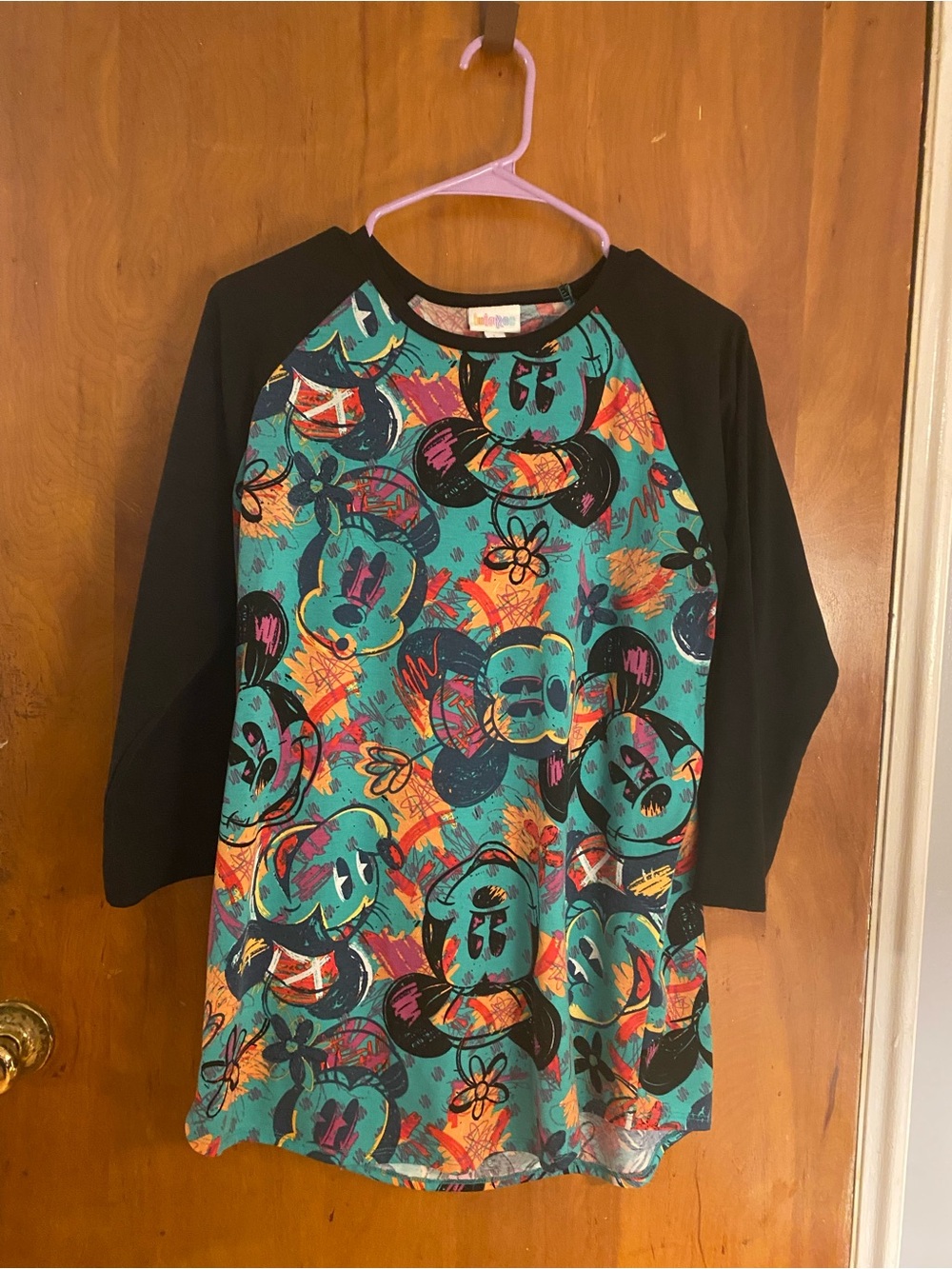 LuLaRoe Teal, Black & Multicolor Mickey Raglan Top